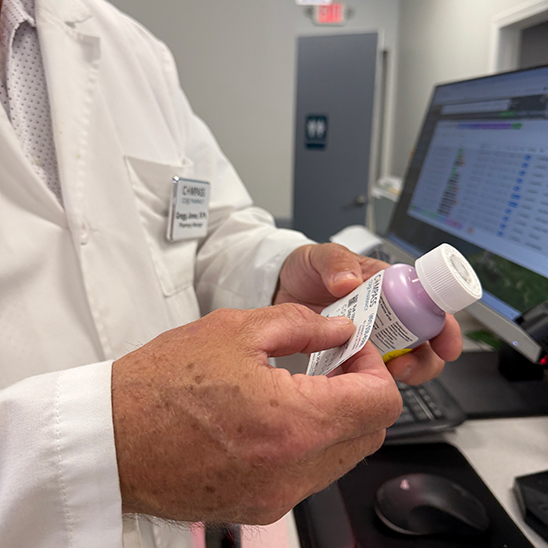 Compass Core pharmacist filling a prescription in Warwick, RI Compass Core pharmacist filling a prescription in Warwick, RI